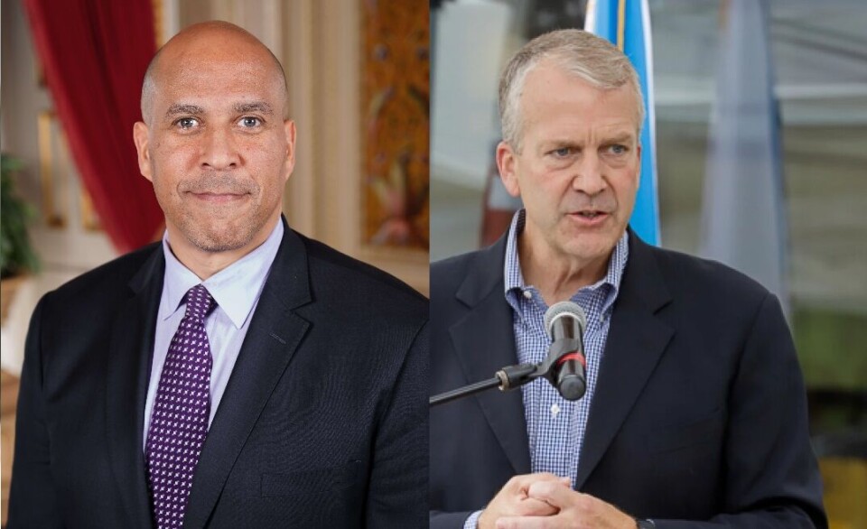 US senators Cory Booker, left, and Dan Sullivan have introduced a bill intended to block the establishment of offshore fish farms until Congress agrees a permitting process.