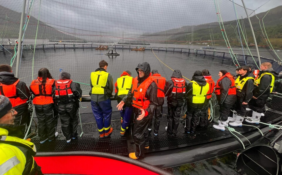 Pupils in the Sea2Me programme on the cage edge at Mowi Scotland's Loch Duich site. The pupils were said to be surprised by how large the salmon pens are and how much room the fish have to move around.