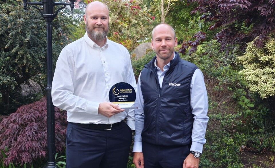 Harbor AS chief executive Christian Bjørnsen, left, and R&D manager Tarald Kleppa with the company's Innovation prize, presented at the Aquaculture Awards in Inverness last week. The company, based in southwest Norway, believes its electric fence for salmon pens can offer protection against micro jellyfish in Scottish waters.