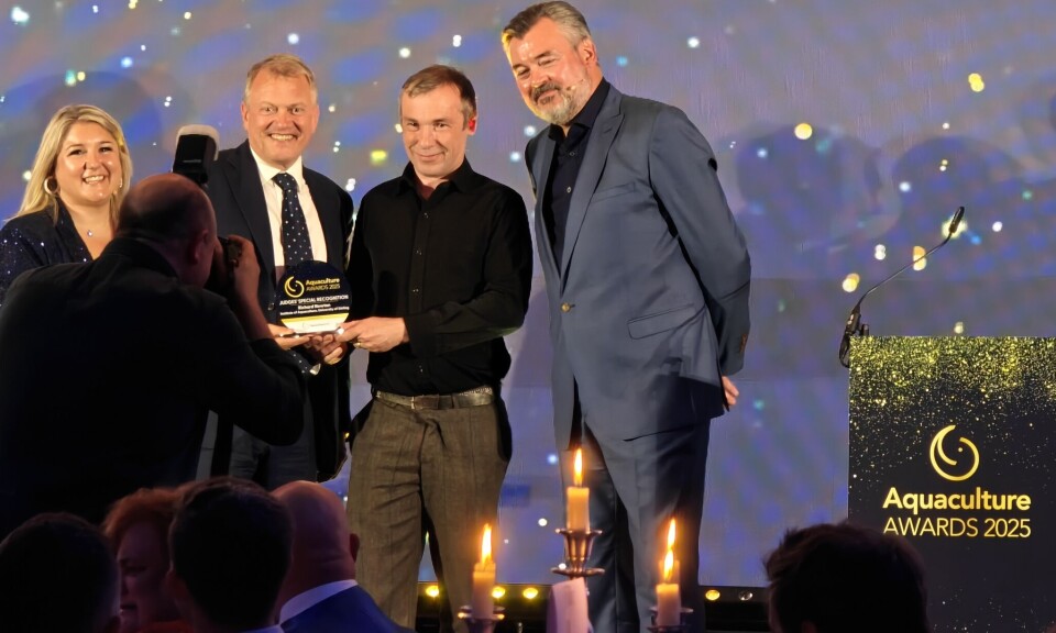 From left: Cheri Arvonio and Carsten Holm from Diversified UK, Richard Newton from Stirling University's Institute of Aquaculture, and awards evening compere Grant Stott.