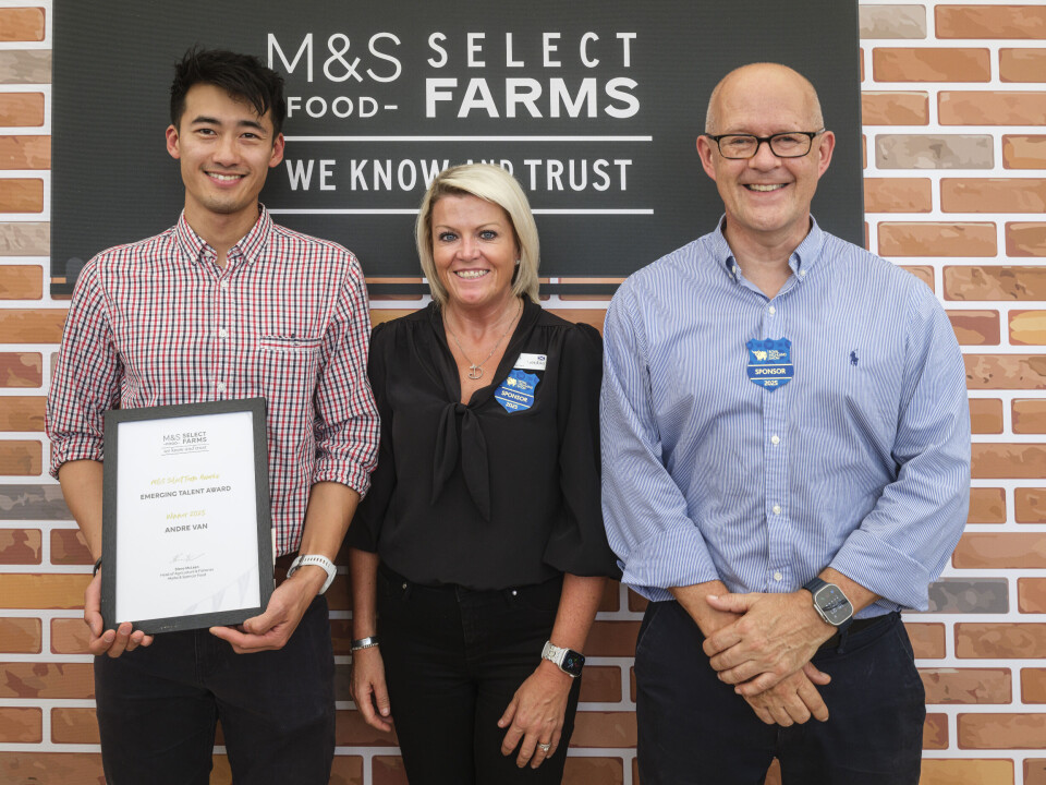 Andre Van with his M&S Emerging Talent Award and M&S representatives.