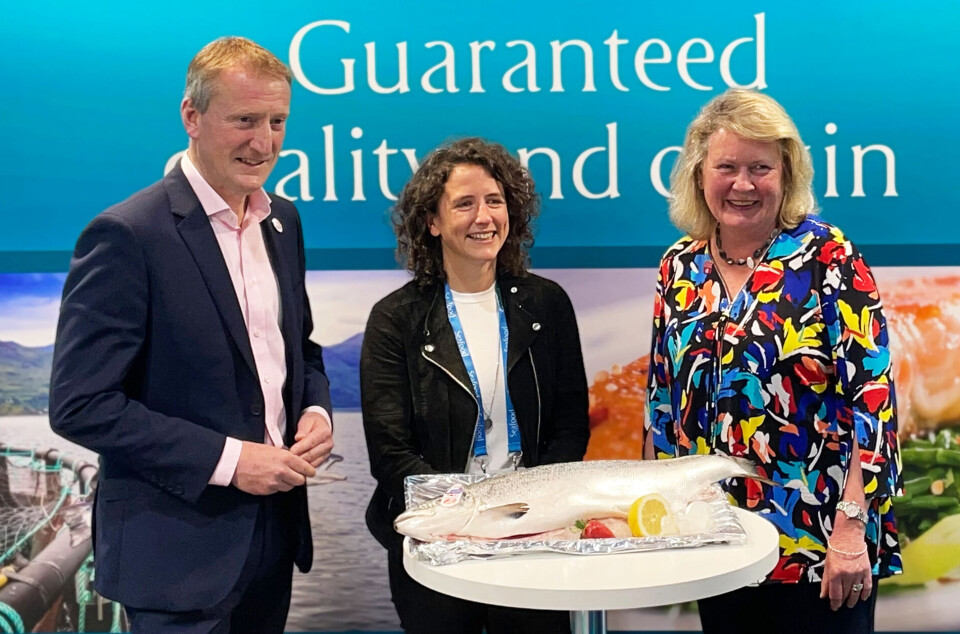 From left: Salmon Scotland chief executive Tavish Scott, Scottish Government Rural Affairs Secretary Mairi Gougeon, and Scottish Quality Salmon chair Su Cox with a Label Rouge salmon.