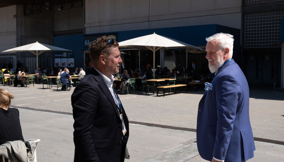 Bluegreen CEO Nils Johan Tufte, left, at Seafood Expo Global in May. 'Many people are interested in hearing how Marine Donut is doing,' he says.