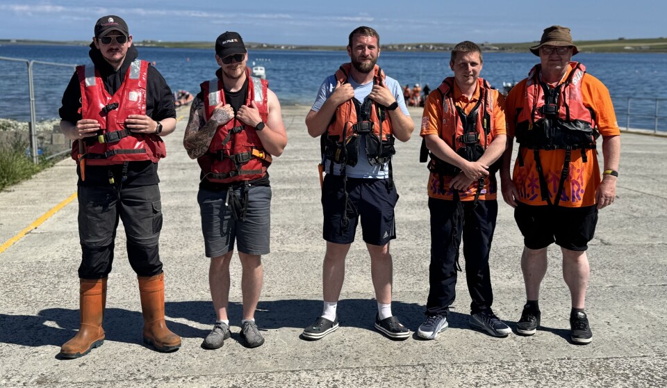 Scottish Sea Farms staff volunteered to help with various tasks, including providing safety cover for sailing events.