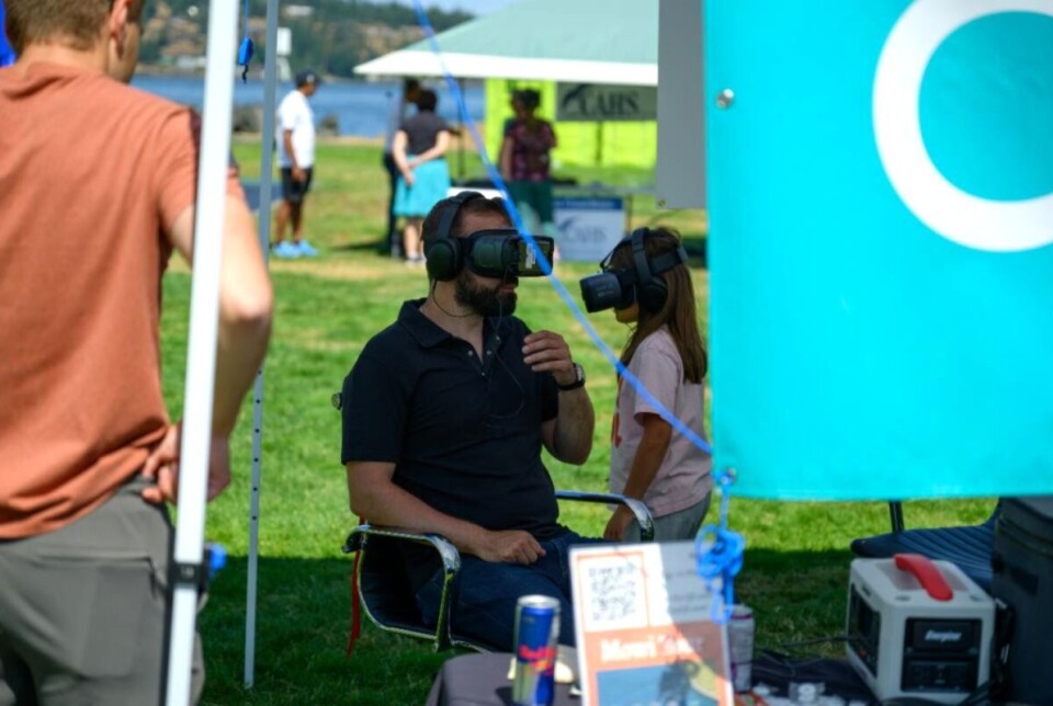 North Island-Powell River MP Aaron Gunn wearing Cermaq Canada’s virtual reality goggles to 'tour' a salmon farm. Cermaq recently agreed a deal to buy Grieg Seafood's operations in BC and Atlantic Canada.