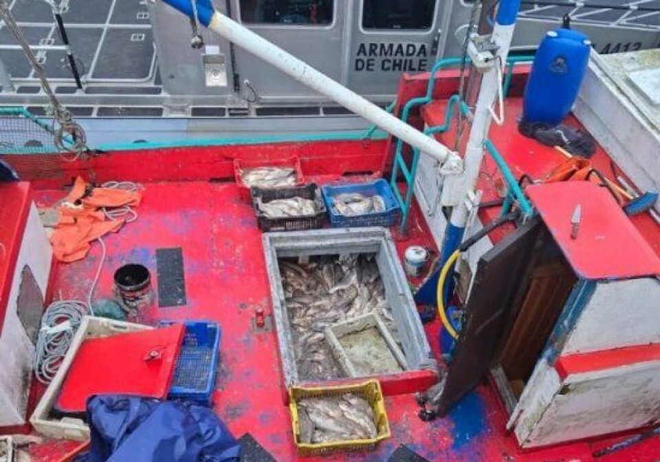 The seized vessel beside a Maritime Police boat.