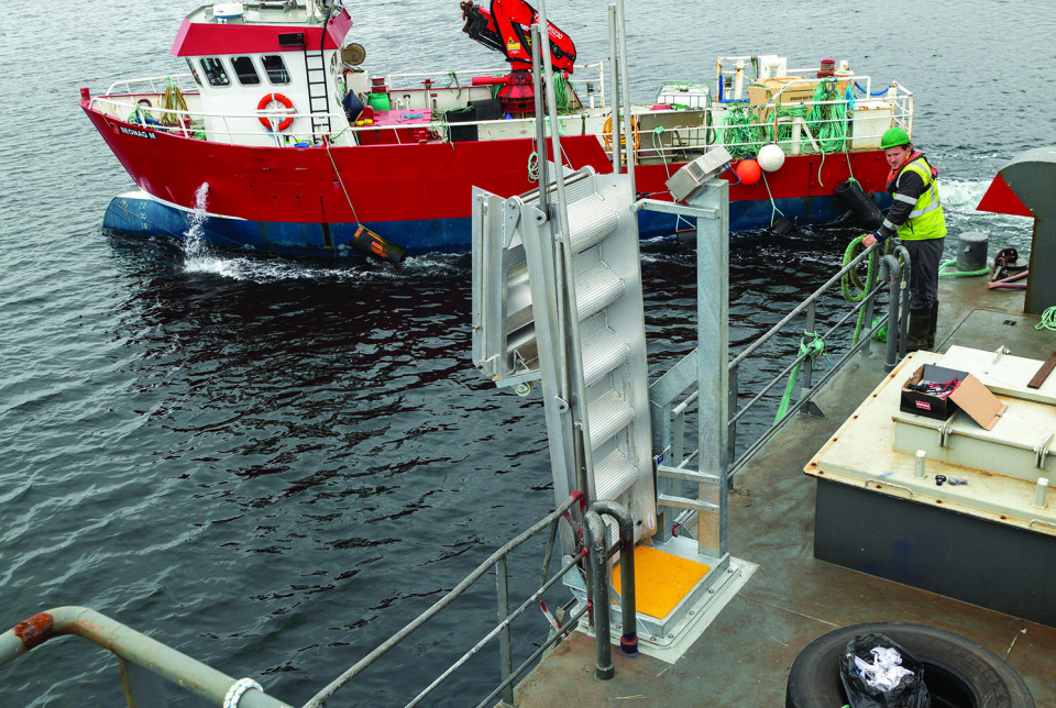 The MMG gangway mounted on a feed barge and seen in the stowed position.