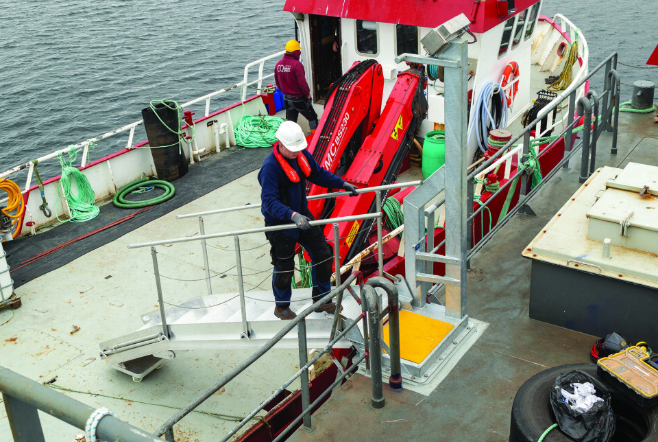 The gangway in use. The wheel-trolley compensates for both barge and boat movement.