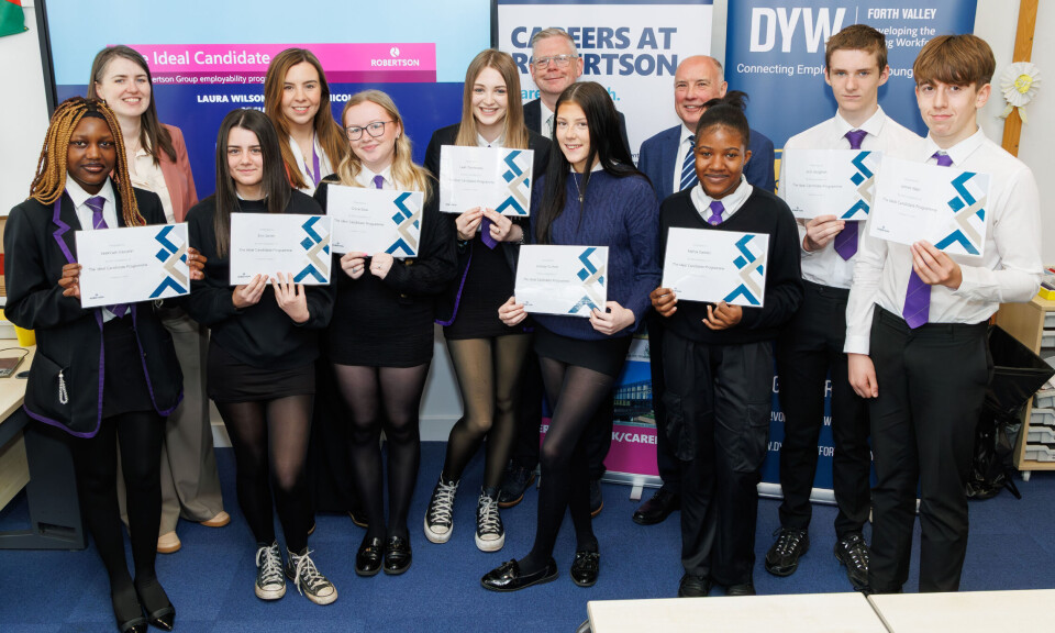 Wallace High pupils with (back row, from left) depute leader of Stirling Council Jen Preston; Laura Wilson, social impact manager, Robertson Construction Central East; Colin McNally, executive director of estates and campus services, University of Stirling; and Reid Gilmour, operations manager, Robertson Construction Central East.