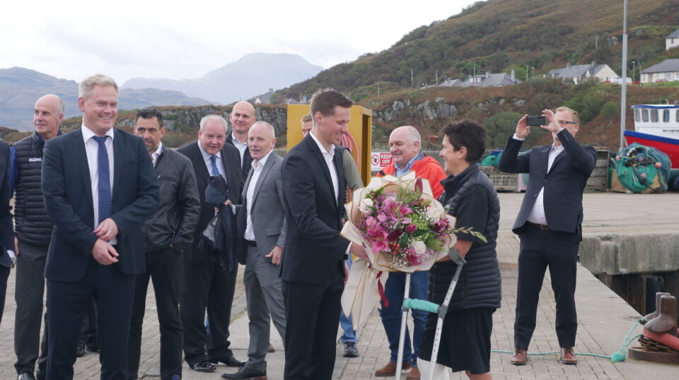 The Scotia's godmother, Rosie Curtis, is presented with flowers by the vessel's captain, Ole Longva. The Scotia has two Norwegian crews who work four weeks on, four weeks off.