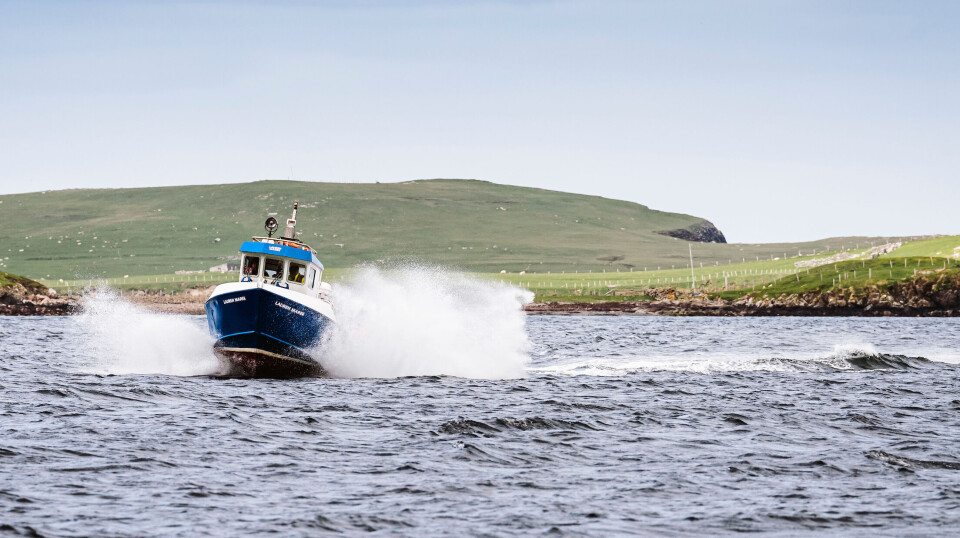 A Scottish Sea Farms workboat in Shetland. SSF will establish Scotland's largest salmon farm in Shetland next year, and will equip it with a 500-tonne-capacity feed barge with a hybrid power system from Fjord Hybrid, inset.