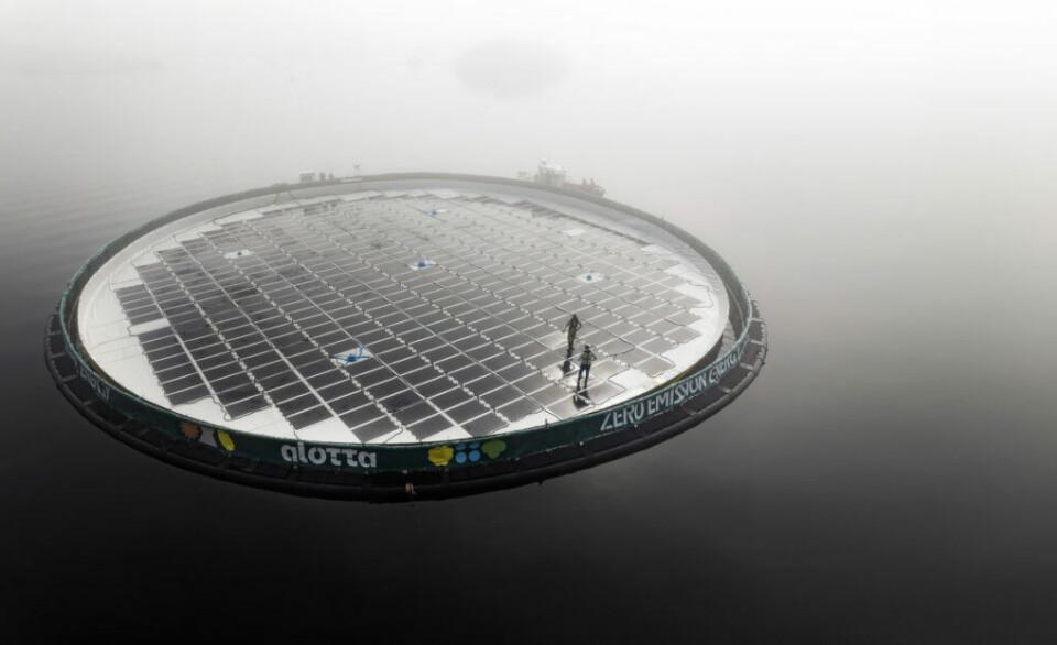 Engineers walking on an Alotta solar energy station in northern Norway.