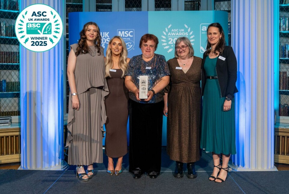 Representatives of BioMar UK collect the company's trophy last night.