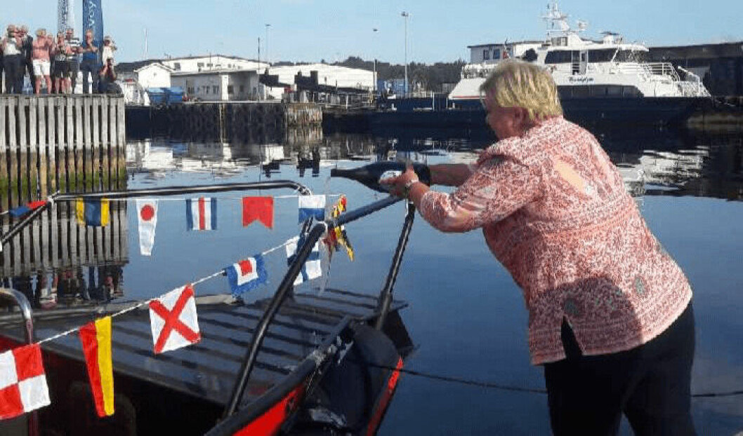 Norwegian prime minister Erna Solberg christens the Evoy 1, which may be the world's fastest electric boat.
