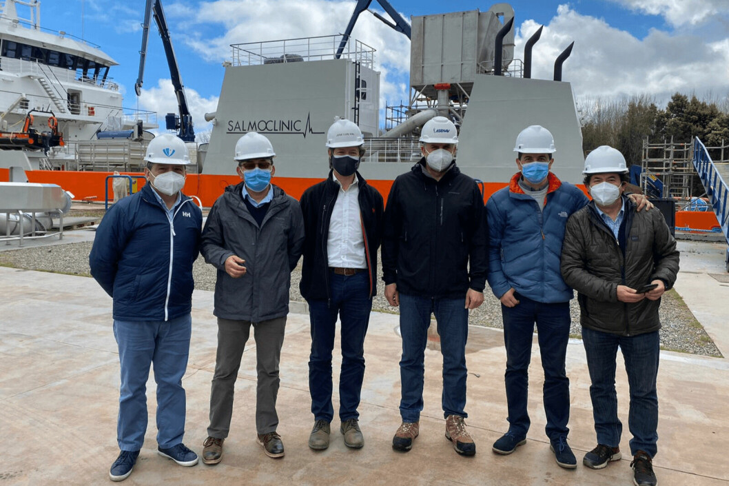 Executives from salmon farmer Ventisqueros and Patagonia Wellboat visit the Owurkan delousing vessel, which is awaiting a helix tank from Europe. Photo: SalmoClinic.
